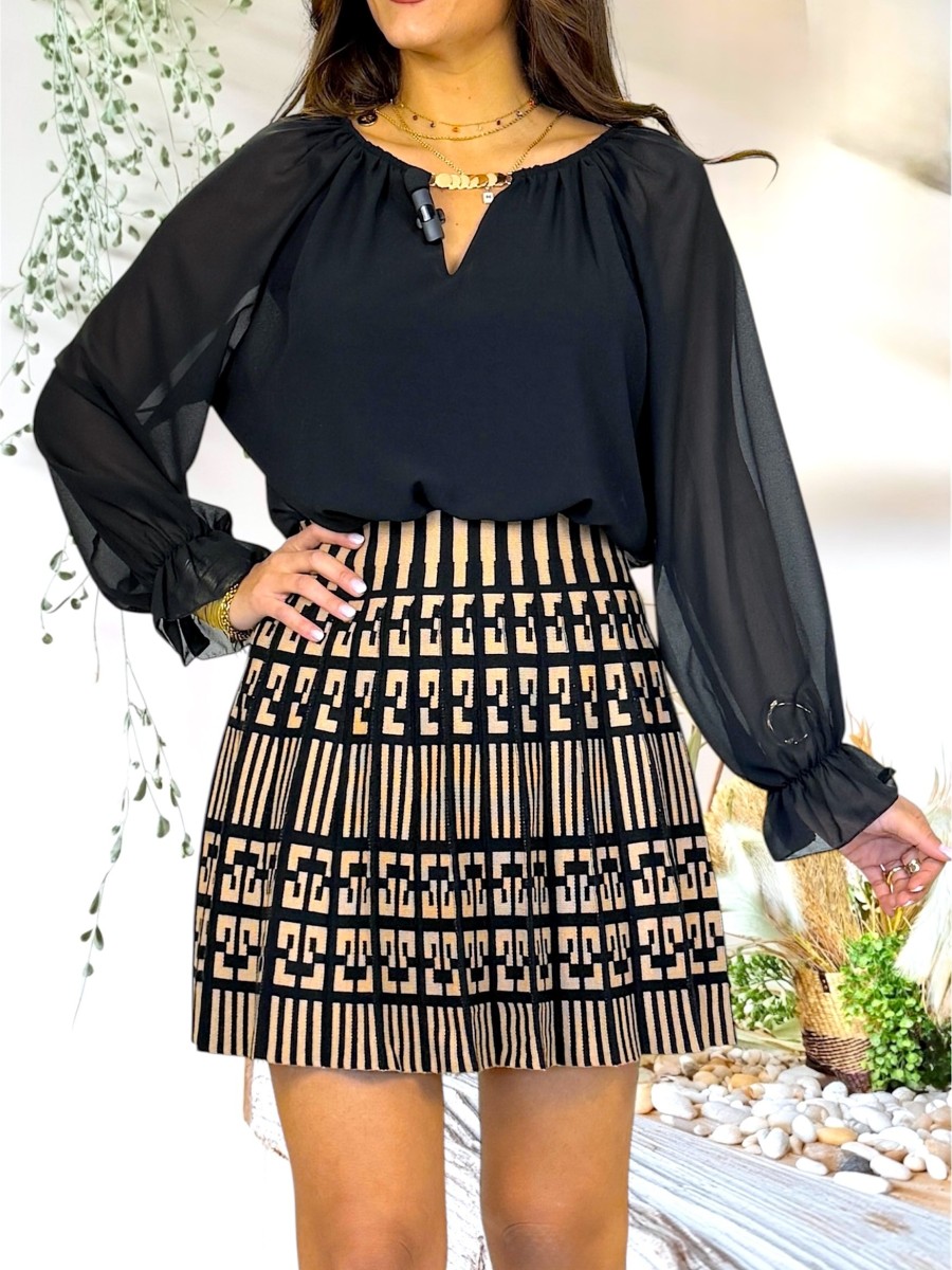 Conjunto Monic de falda y blusa