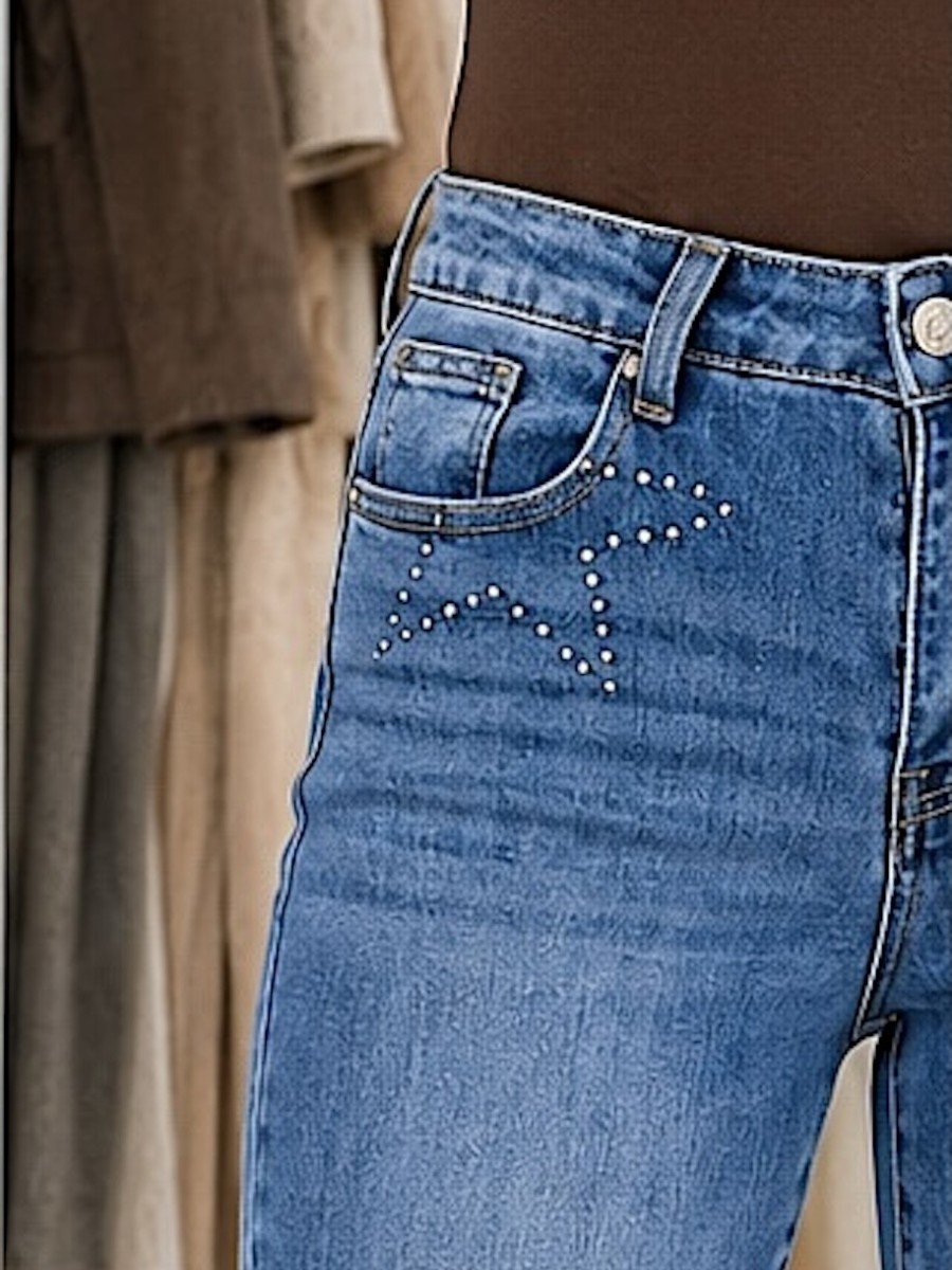 Pantalon vaquero tachuelas estrella